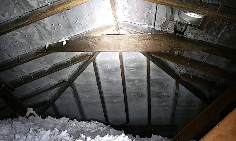 Image of frost build up on the attic roof sheeting due to high relative humidity in the home