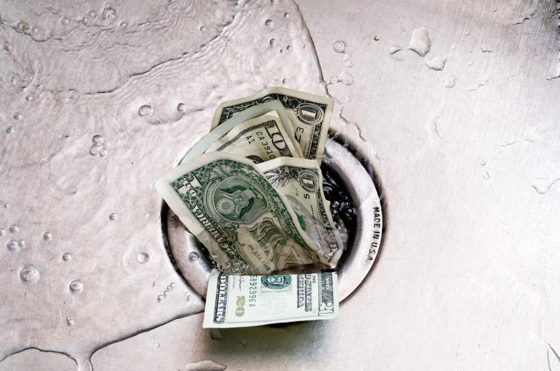 money going down a sink drain
